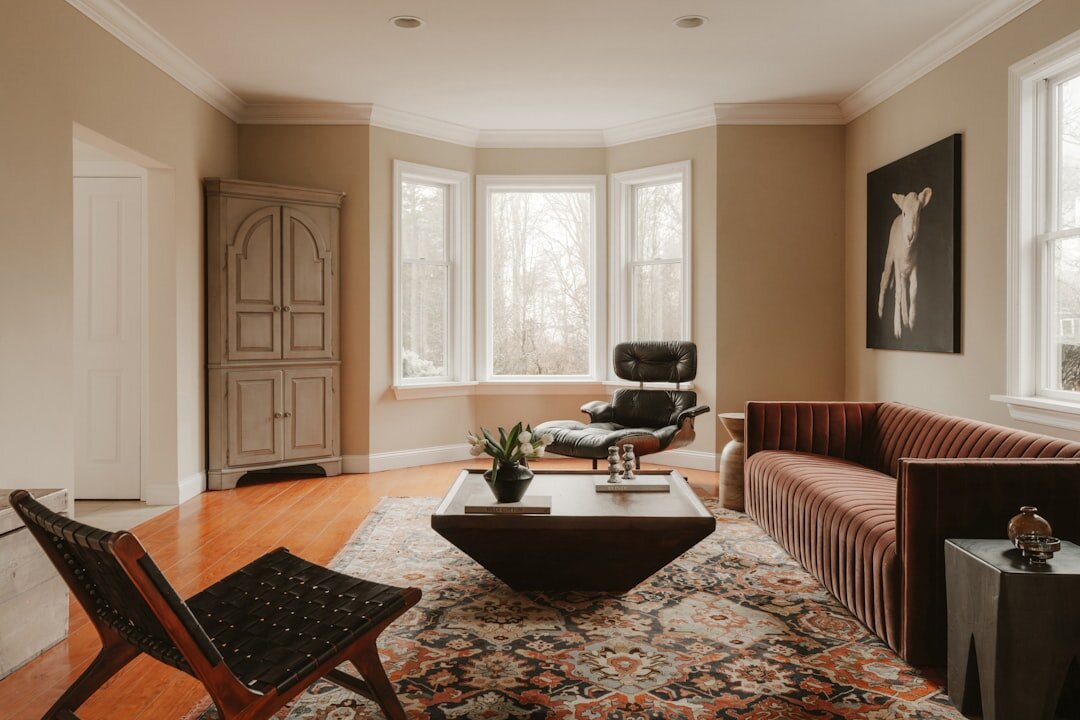 Elegant celebrity-style living room with velvet sofa and gold accents